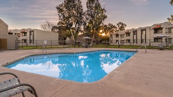 Riverstone view of hot tub and spa with plenty of relaxation and trees surrounding